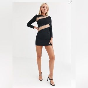 ASOS DESIGN long sleeve bodycon mini dress with mesh and rhinestone cut out.